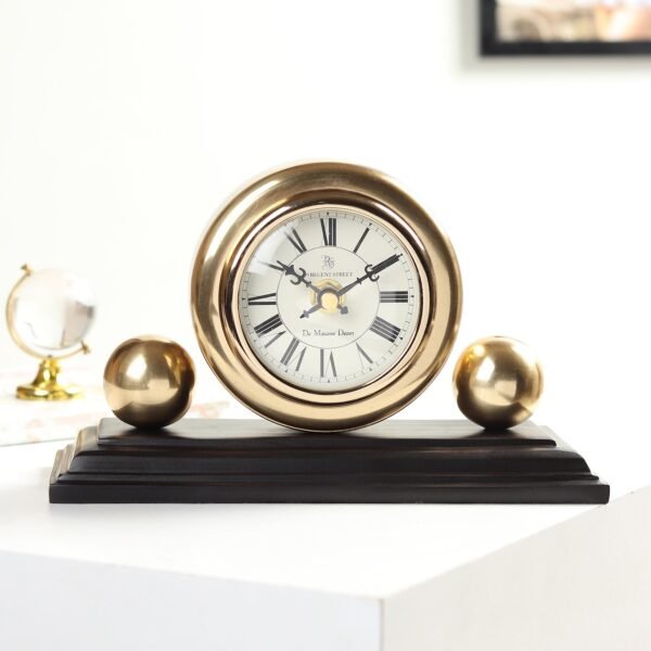 Orbitron table clock in gold